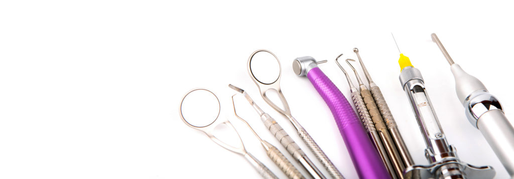 Dental tools and equipment. Over white background - Clinica Dental